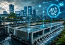 Interview: Vom Sensor zur Blockchain – JUMBO BLOCK setzt auf IOTA Futuristische Stadt mit intelligentem Wassermanagement, modularer Infrastruktur und digitalem IOTA-Netzwerk im Hintergrund.