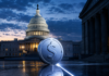 Silberner Stablecoin vor dem US-Kapitol als Symbol für den Streit um den CLARITY Act
