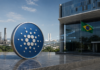 Cardano baut Präsenz in Brasilien aus: Petrobras wird zum Vorzeigeprojekt Cardano-Symbol vor einer brasilianischen Unternehmenszentrale und Industrieanlage