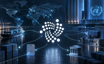 IOTA-Symbol vor einer Weltkarte, Handelswegen und dem UN-Emblem