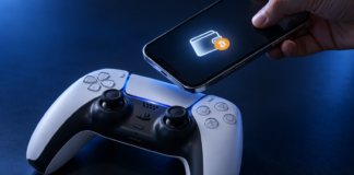 PlayStation-Controller neben einem Smartphone mit Wallet- und Bitcoin-Symbol.