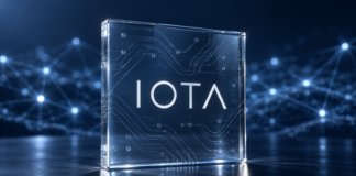 IOTA aktiviert Protokoll 38: Das bringt das neue Mainnet-Update IOTA-Schriftzug auf einer Glasplatte vor einem blauen Netzwerk aus verbundenen Knoten.
