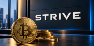 Strive schlägt erneut zu: 3.311 Bitcoin gekauft – Bestand wächst auf 32.773 BTC Goldene Bitcoin-Münzen vor einem großen Strive-Schriftzug mit blauer Akzentbeleuchtung.